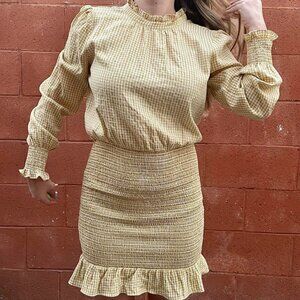 Yellow gingham long sleeved dress with ruched bodycon skirt